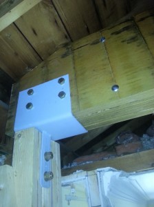 Post and Beam connection against exterior wall.